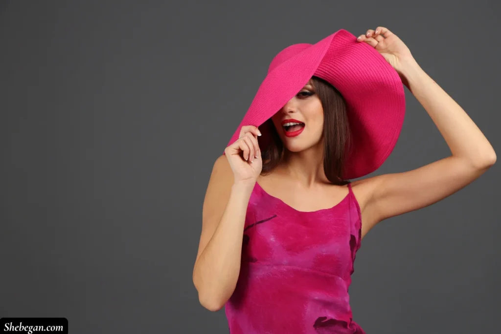 A lady wearing a pink dress