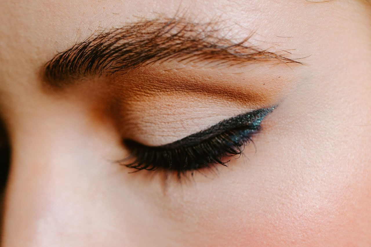 Wearing only eyeliner