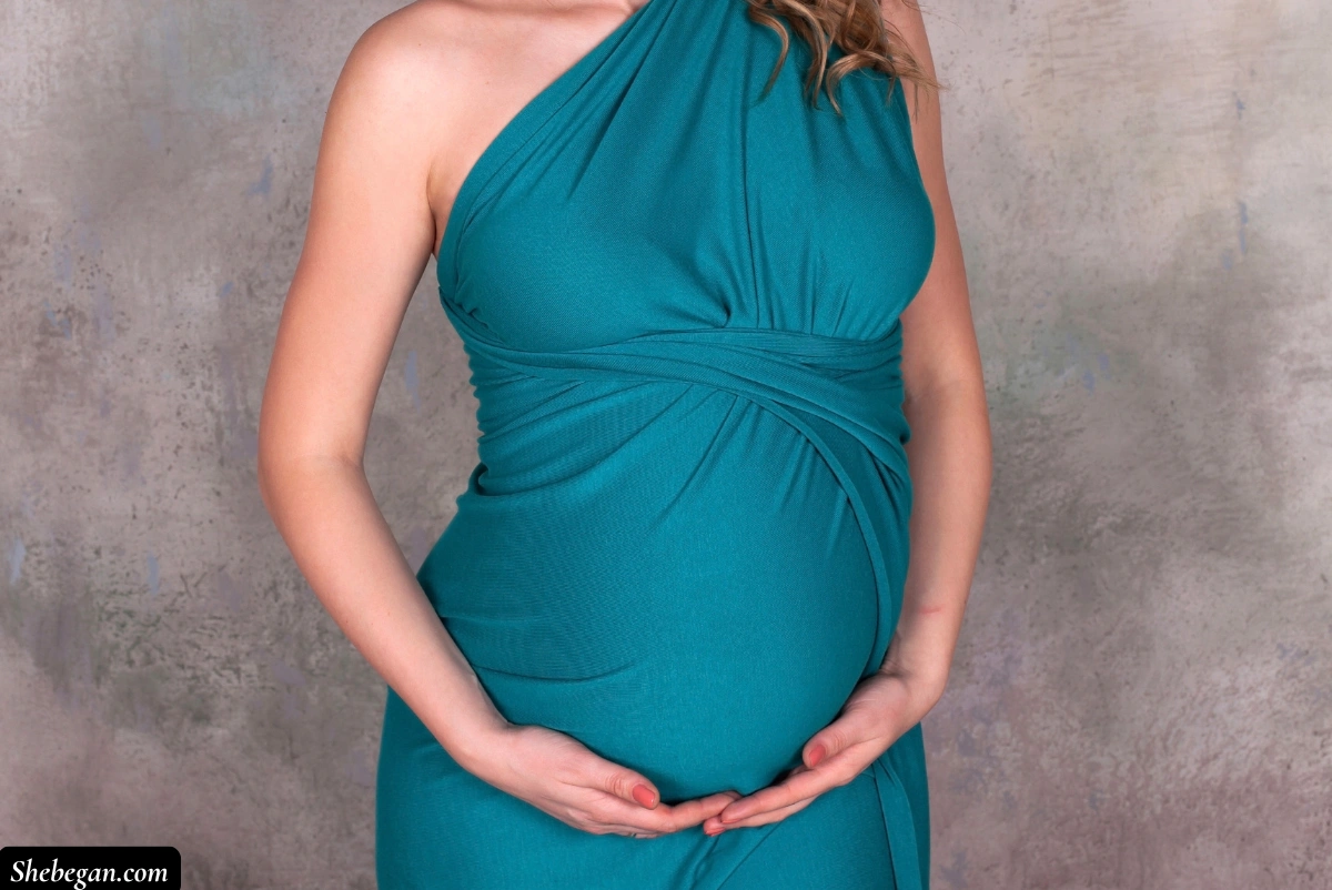 Torquoise blue dress with coral nails